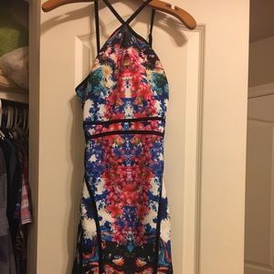 Floral dress with mesh bottom and open back